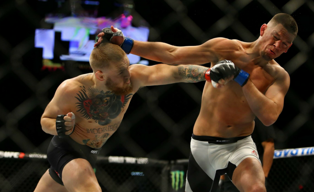 Conor McGregor lands his left hand on Nate Diaz