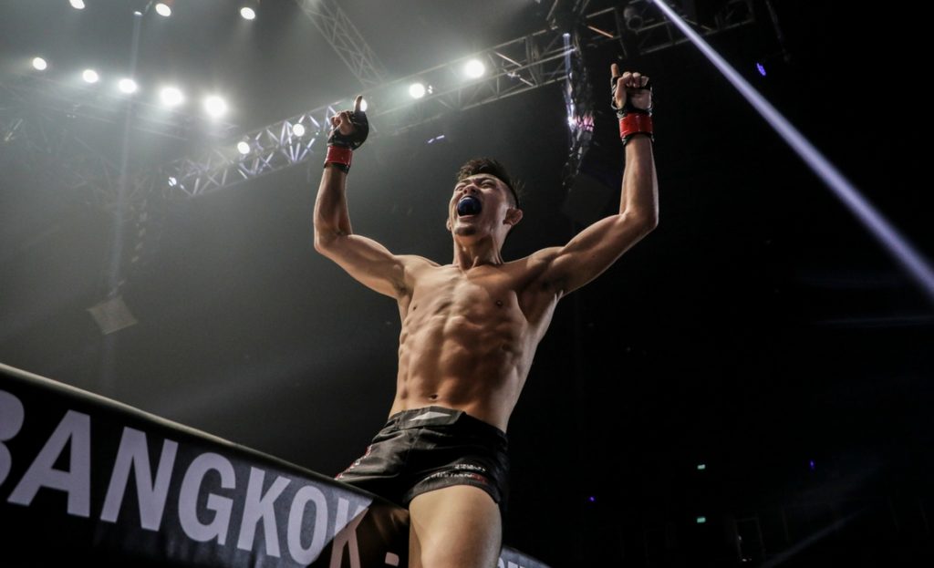Christian Lee celebrates after defeating Kotetsu Boku