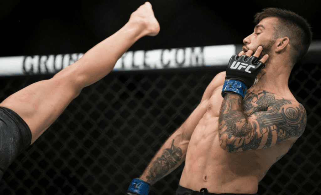 Matheus Nicolau evades a Louis Smolka kick
