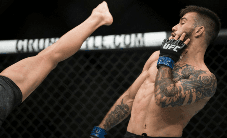 Matheus Nicolau evades a Louis Smolka kick