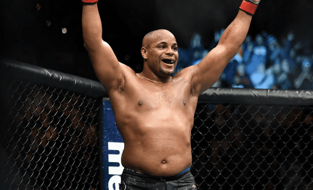 Daniel Cormier celebrates after defeating Volkan Oezdemir at UFC 220