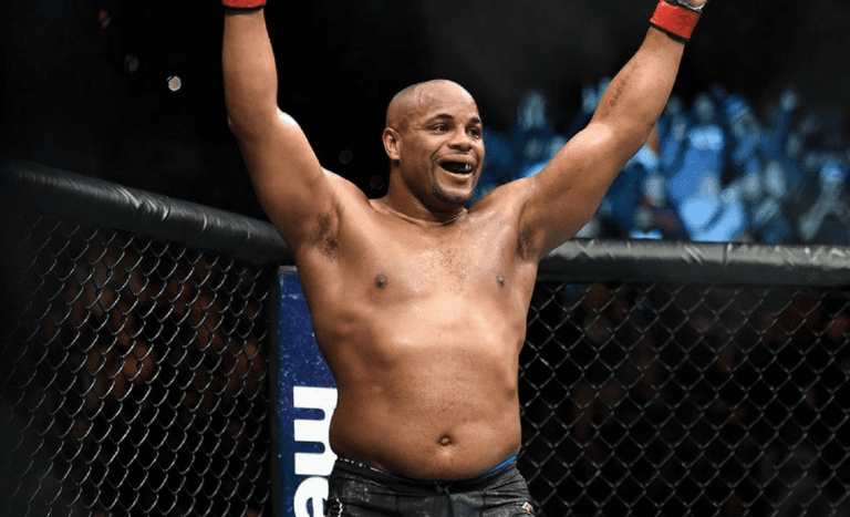Daniel Cormier celebrates after defeating Volkan Oezdemir at UFC 220