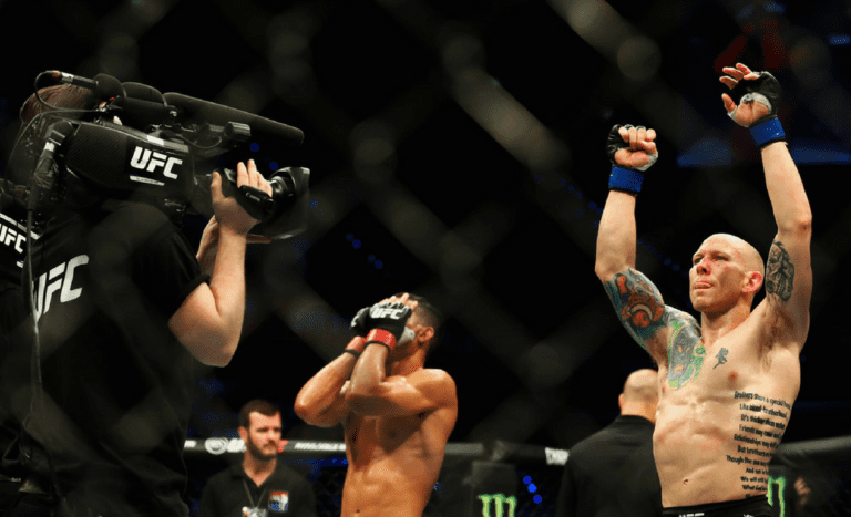 Jon Tuck of the USA looks dejected as Josh Emmett wins