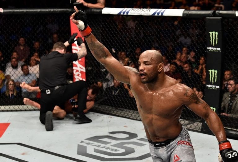 How did Yoel Romero upset Luke Rockhold at UFC 221?