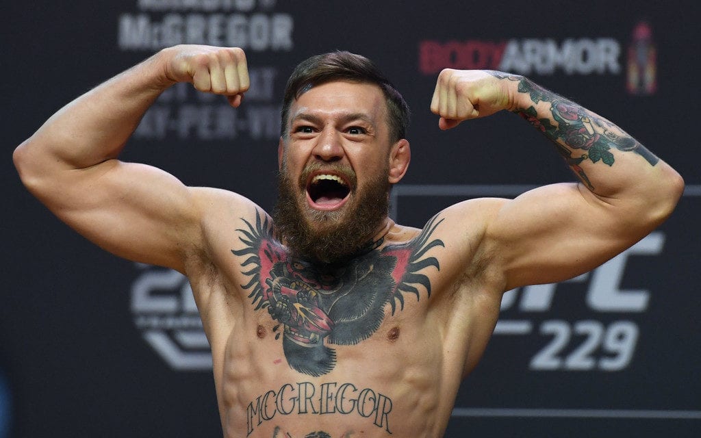 Conor McGregor poses during a ceremonial weigh-in for UFC 229