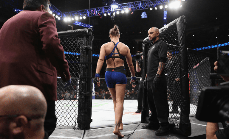 Ronda Rousey enters the Octagon to face Amanda Nunes
