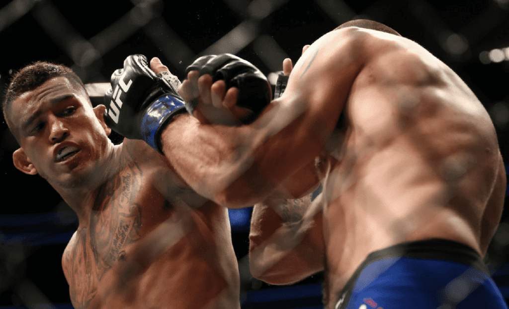 Anthony Pettis punches Jim Miller in their lightweight bout