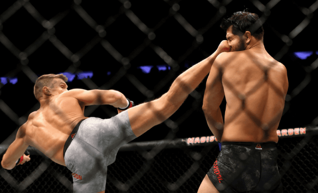 Stephen Thompson lands a kick against Jorge Masvidal
