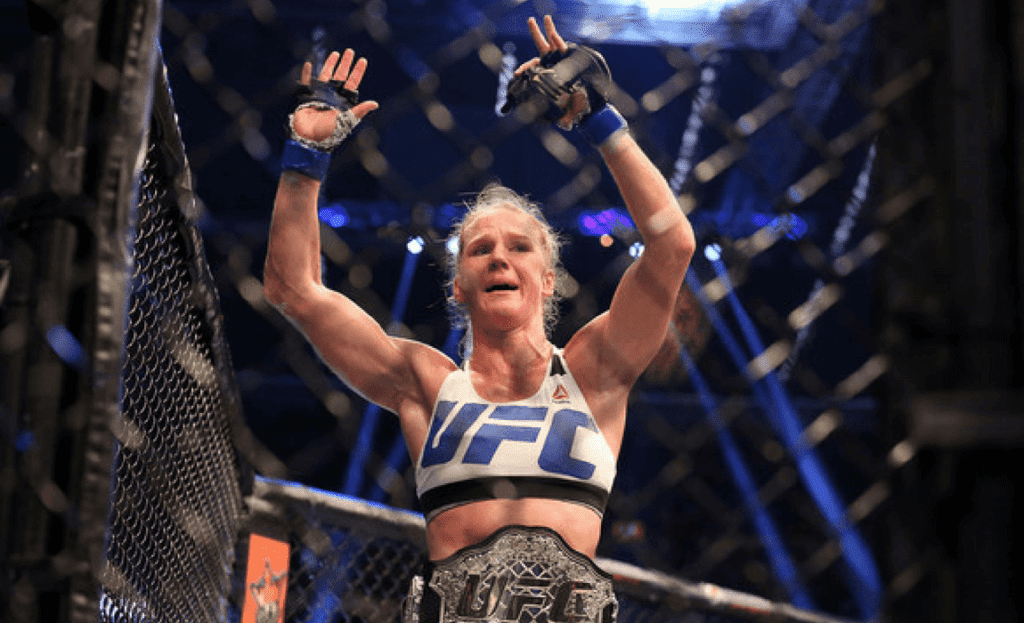 Holly Holm of the United States celebrates victory over Ronda Rousey