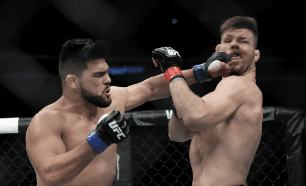 Kelvin Gastelum fights with Michael Bisping