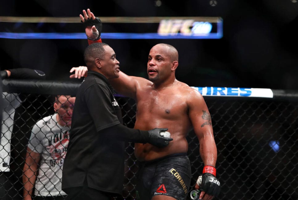 Daniel Cormier reacts after his fight against Volkan Oezdemir in their Light Heavyweight Championship fight during UFC 220