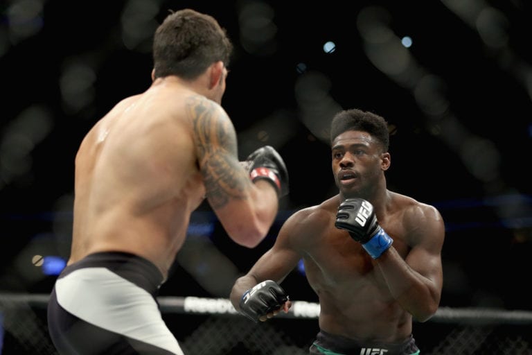 Raphael Assuncao of Brazil (black trunks) fights Aljamain Sterling (green trunks) in the Bantamweight division during the UFC Fight Night event