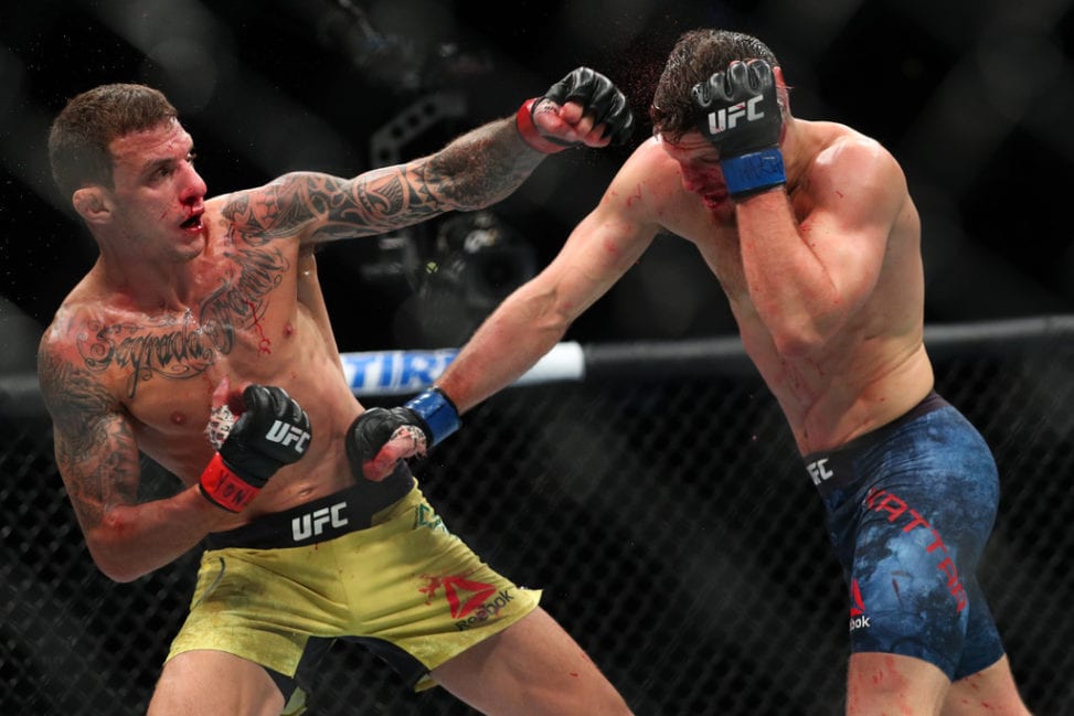 Renato Moicano lands a left hand to the head of Calvin Kattar at UFC 223