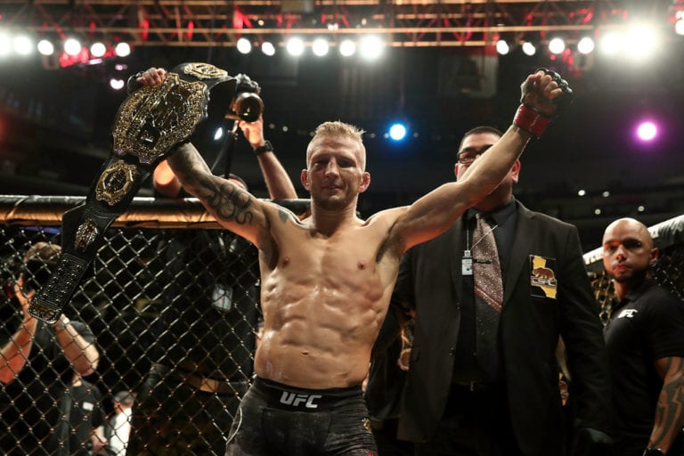 TJ Dillashaw celebrates his UFC Bantamweight Title Bout win over Cody Garbrandt during UFC 227