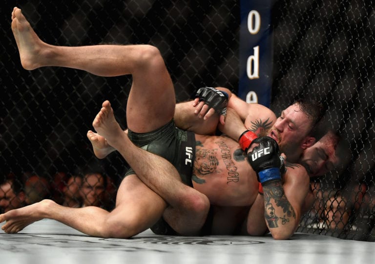 Khabib Nurmagomedov of Russia holds down Conor McGregor at UFC 229