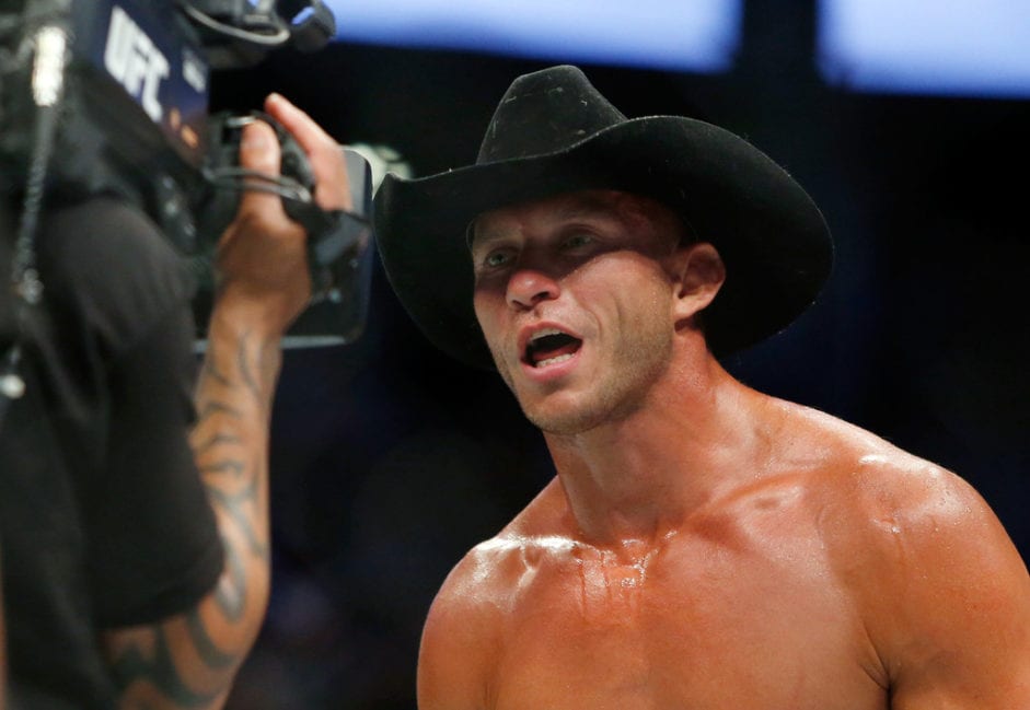 Donald Cerrone reacts after his second-round TKO win over Rick Story in their welterweight bout at UFC 202