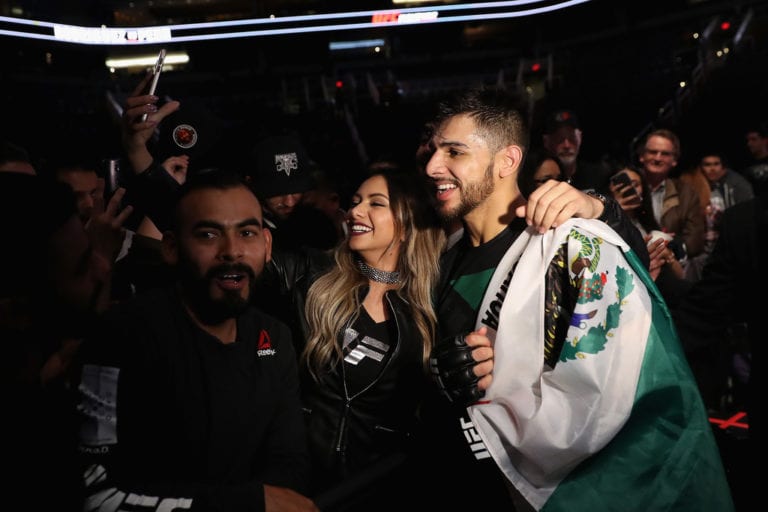 Yair Rodriguez poses with fans after his victory over BJ Penn