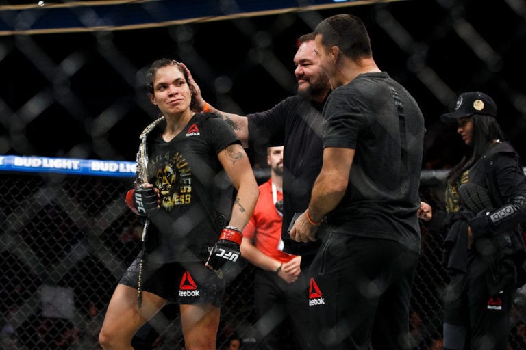 Amanda Nunes celebrates her victory against Valentina Shevchenko during UFC 215