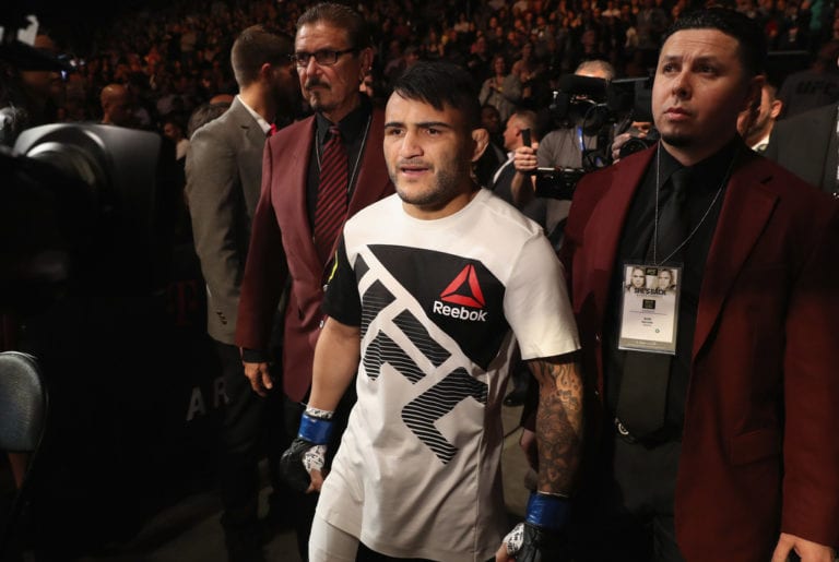 John Lineker of Brazil walks to the Octagon to face TJ Dillashaw in their bantamweight bout during the UFC 207 event