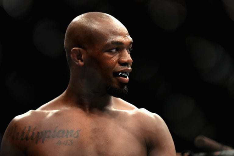 Jon Jones looks on prior to a fight against Daniel Cormier in the Light Heavyweight title bout during UFC 214