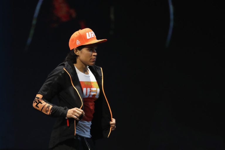 Amanda Nunes of Brazil walks onto the stage and up to the scale during the UFC weigh-in at the Park Theater on July 7, 2017 in Las Vegas, Nevada.