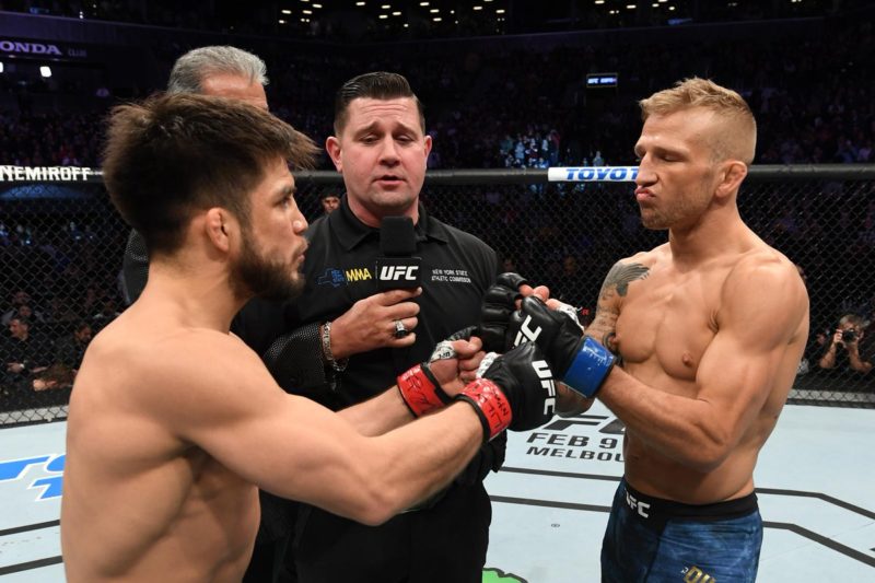 Henry Cejudo and TJ Dillashaw touch gloves before UFC Fight Night 143