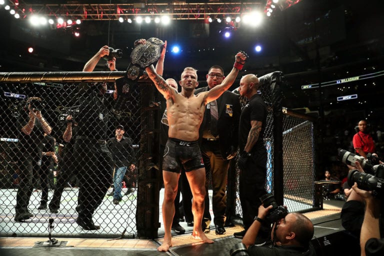 TJ Dillashaw celebrates his UFC Bantamweight Title Bout win over Cody Garbrandt during UFC 227