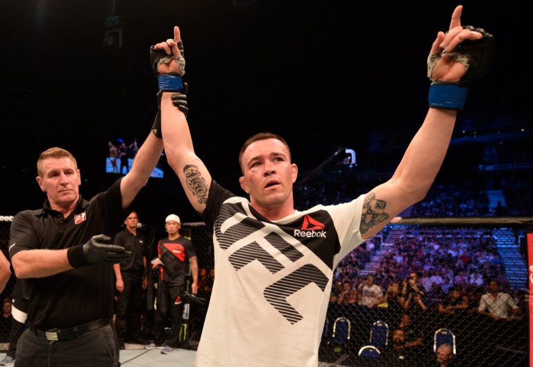 Colby Covington defeats Dong Hyun Kim via UD (30-25, 30-26, 30-27) at UFC Singapore