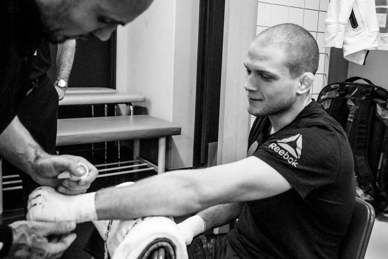 Alex Morono has his hands wrapped before fighting at UFC event