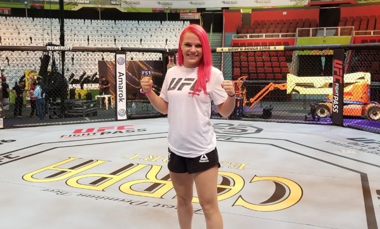 Gillian Robertson waits inside the UFC's octagon