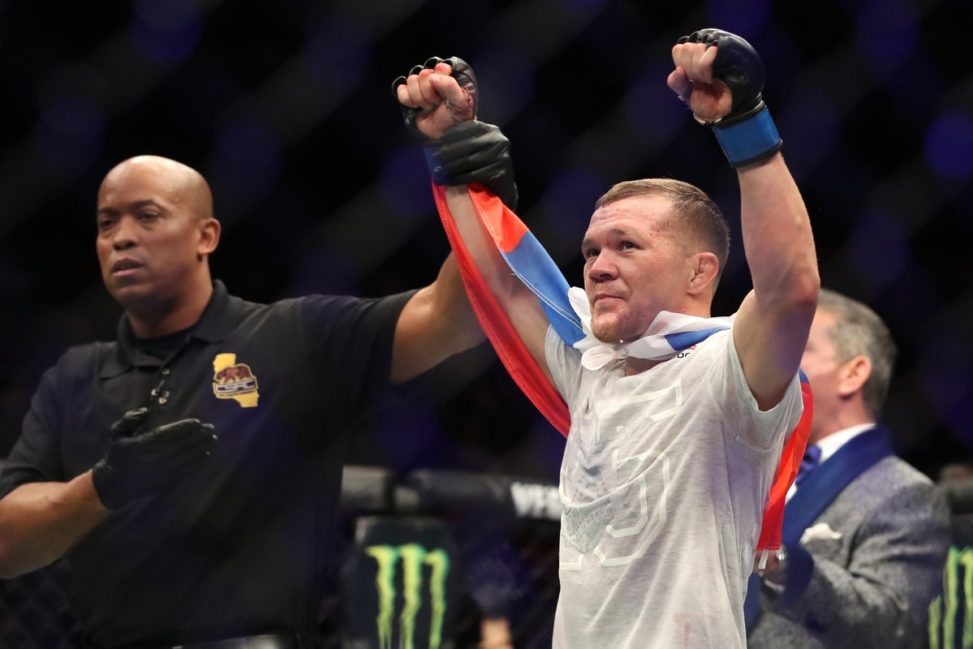 Petr Yan celebrates a UFC victory