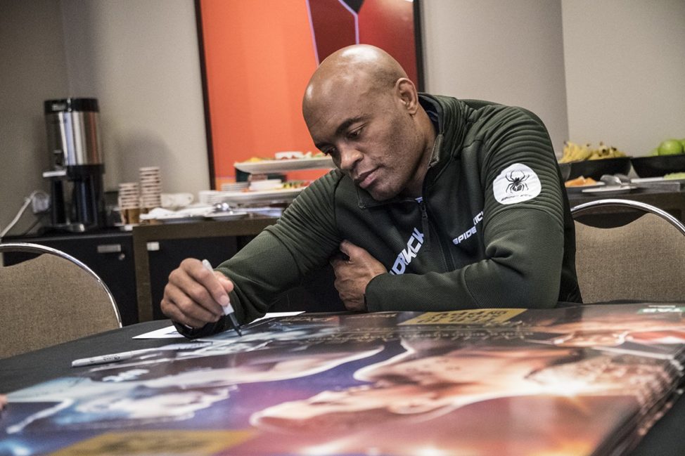 Anderson Silva signs UFC 234 posters in Melbourne, Australia