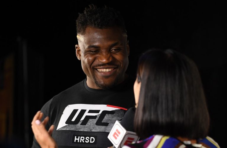 Francis Ngannou speaks to Megan Olivi backstage before UFC on ESPN 1
