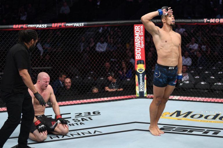 Johnny Walker knocks out Misha Cirkunov in the UFC with a flying knee