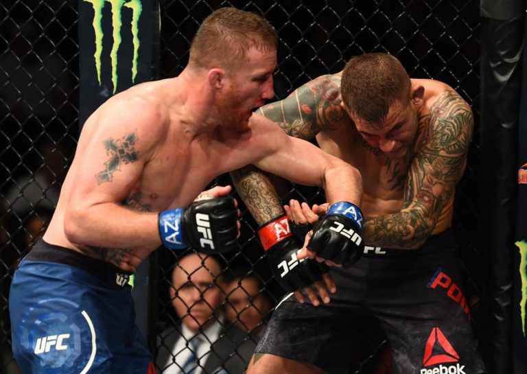 Justin Gaethje strikes Dustin Poirier in a lightweight UFC bout