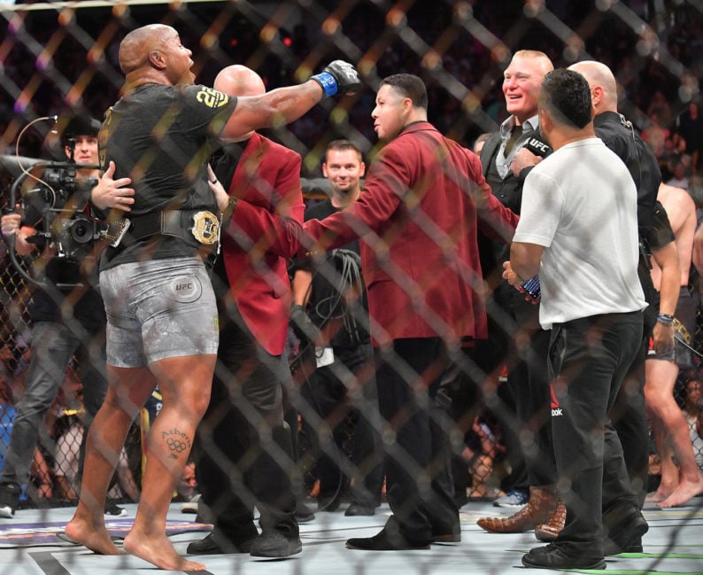 Daniel Cormier and Brock Lesnar inside the UFC cage