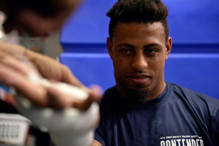 Greg Hardy has his hands wrapped before competing on Dana White's Tuesday Night Contender Series