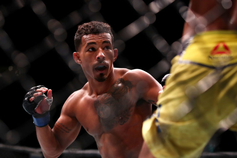 Eric Shelton of the United States of America shapes up against Jenel Lausa