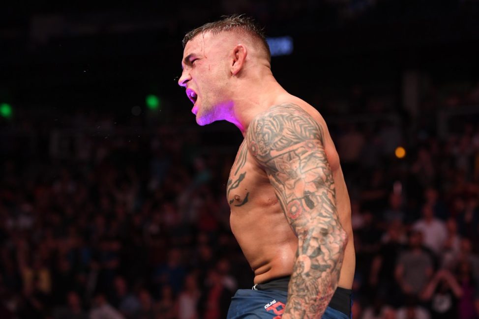 Dustin Poirier celebrates after the fight with Max Holloway at UFC 236