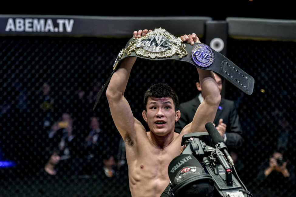 Shinya Aoki receives his ONE Championship lightweight title after defeating Eduard Folayang
