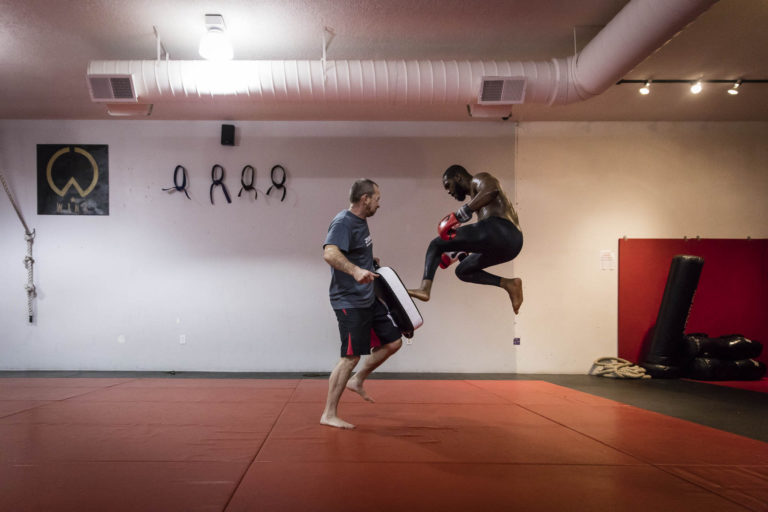 Jon Jones practices a flying oblique kick