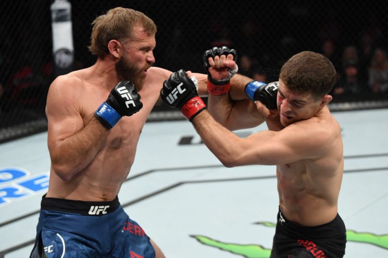 Donald Cerrone lands a left punch against Al Iaquinta at UFC Fight Night 151