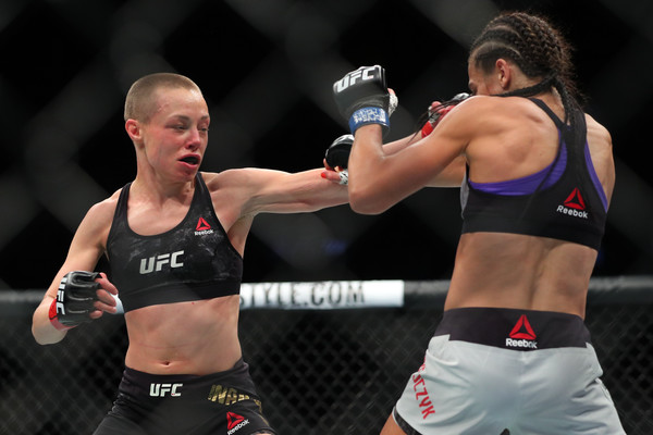 UFC strawweight champion Rose Namajunas (L) throws a left hand at Joanna Jedrzejczyk