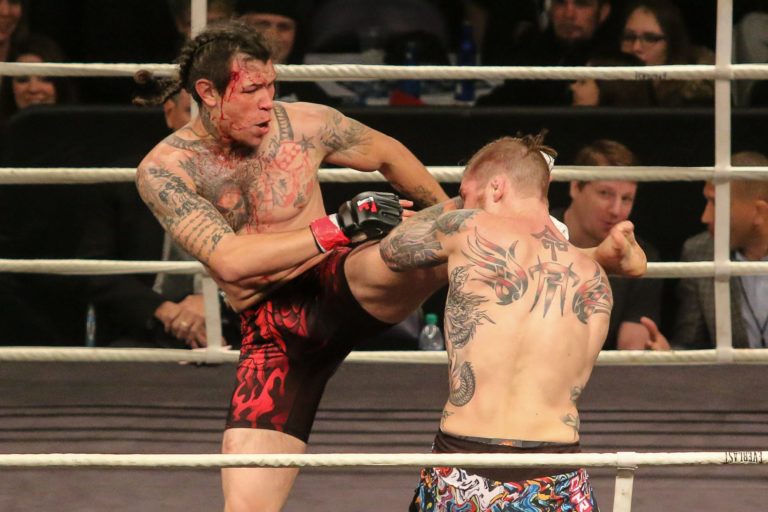 Brok Weaver kicks Tyler Hill at an Island Fights matchup