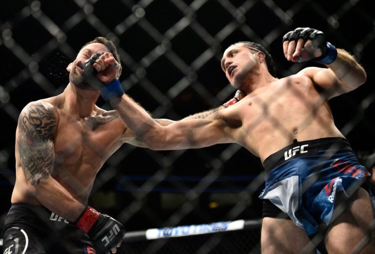 Brian Ortega lands a heavy punch against Frankie Edgar