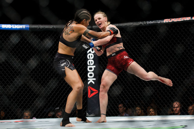 Amanda Nunes, left, fights Valentina Shevchenko during UFC 215