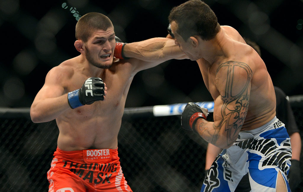 Khabib Nurmagomedov and Gleison Tibau fighting at UFC 148