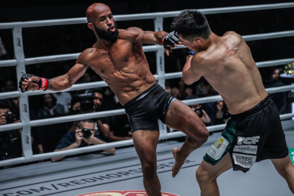 Demetrious Johnson attempts a kick against Tatsumitsu Wada at ONE Championship: Dawn of Heroes in Manila, Philippines
