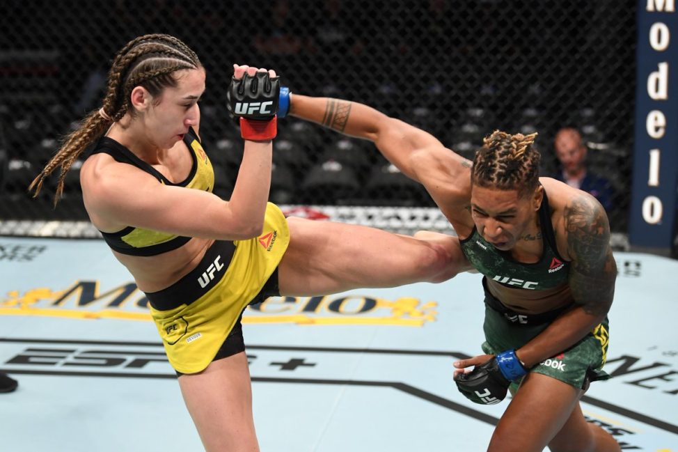 Sabina Mazo lands a body kick against Shana Dobson