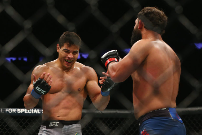 Paulo Costa of Brazil fights Johny Hendricks in their middleweight bout during the UFC 217 event